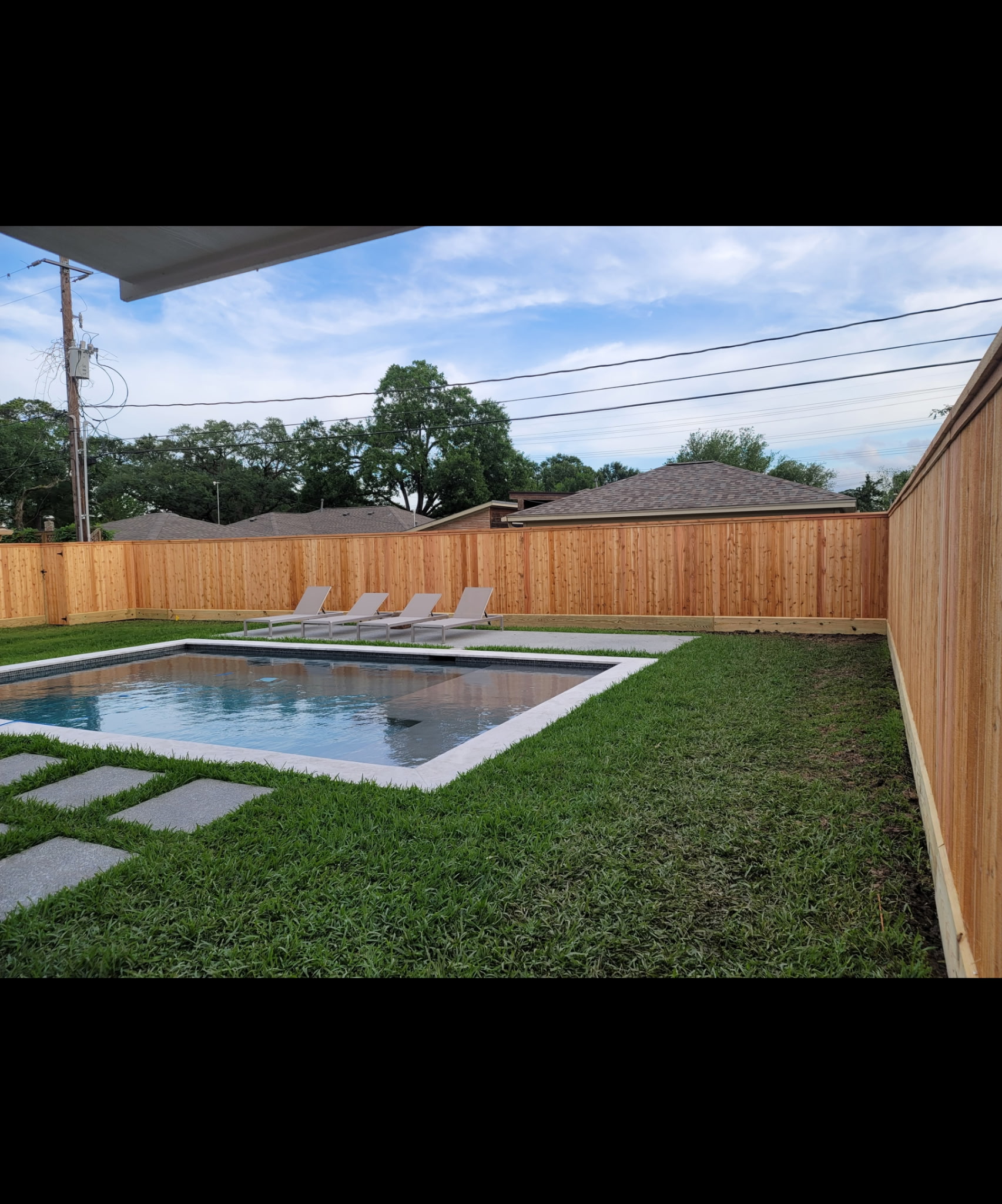 Long cedar fence run