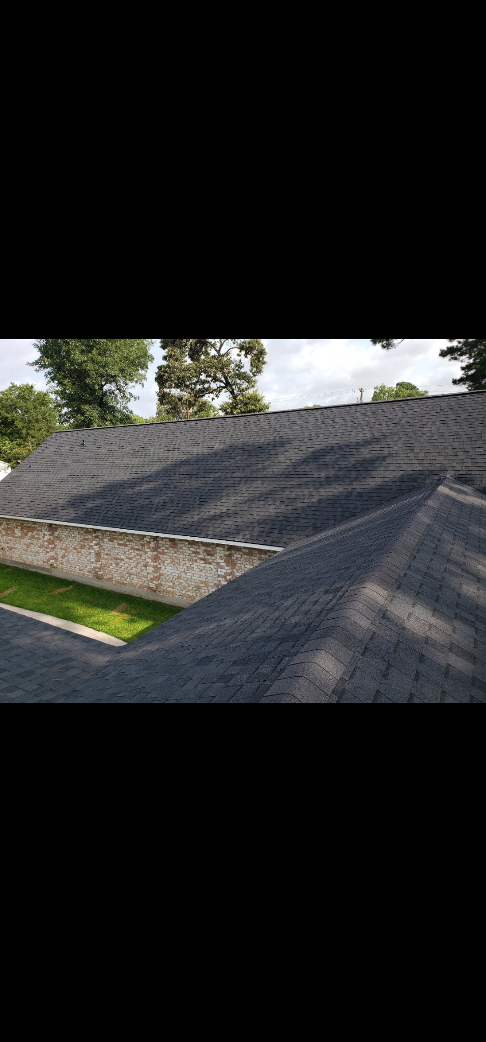 Finished dark shingle roof